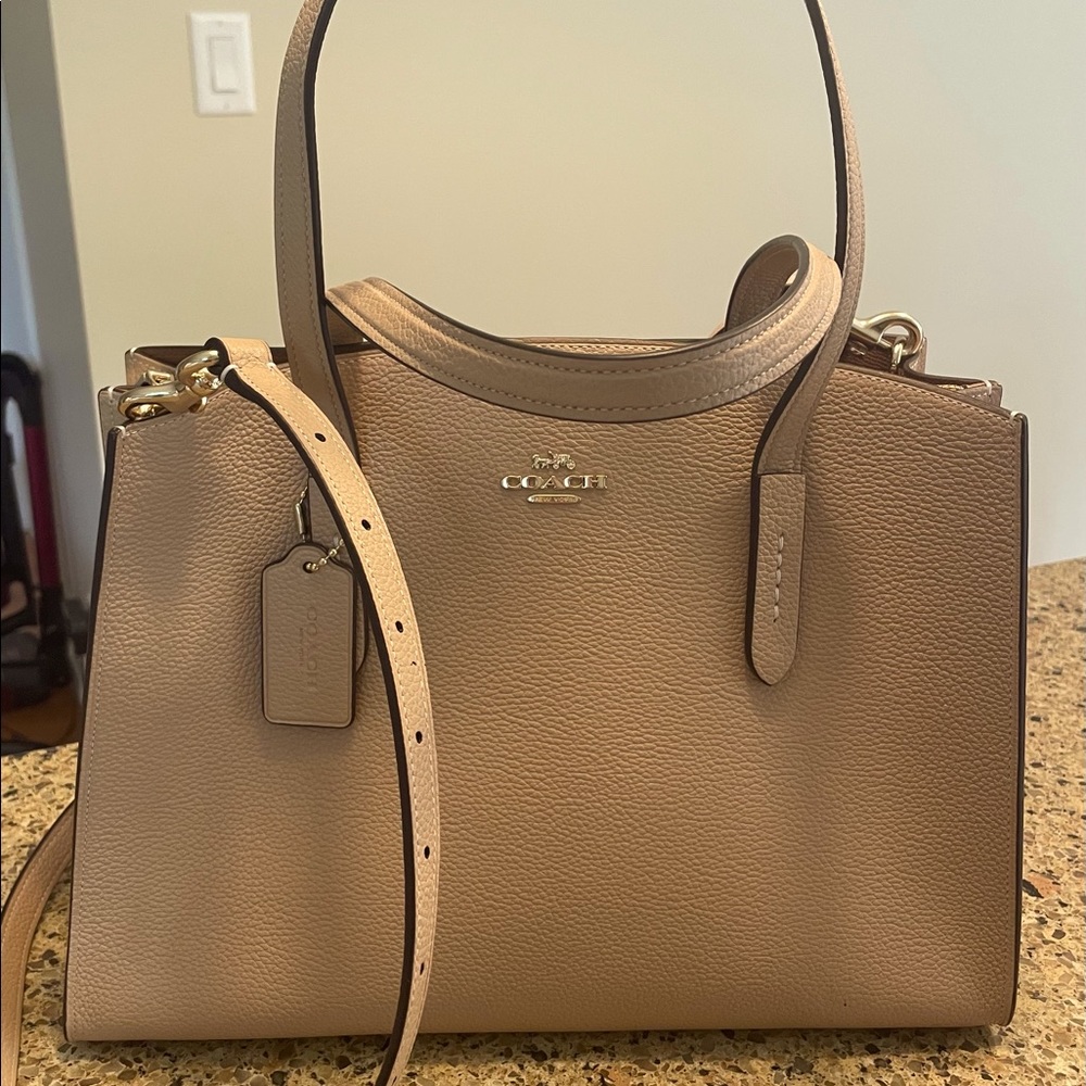 Coach Charlie Carryall